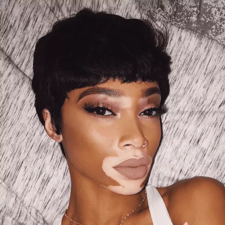 Thick, Wavy Pixie, Winnie Harlow with a hobgoblin hairstyle and baby bangs